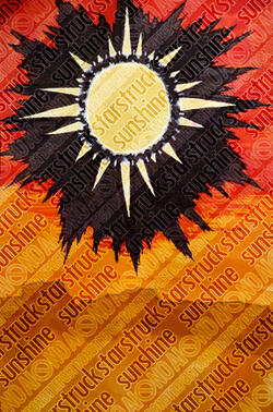 A sun with several spikes for beams, resting in a black tear in the sky above a desert.
